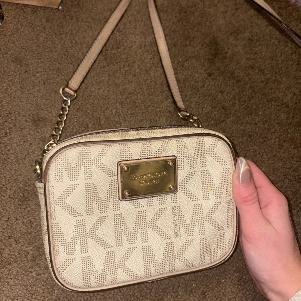 Michael Kors Cream Crossbody Bag with Monogram Pattern and Gold Hardware
